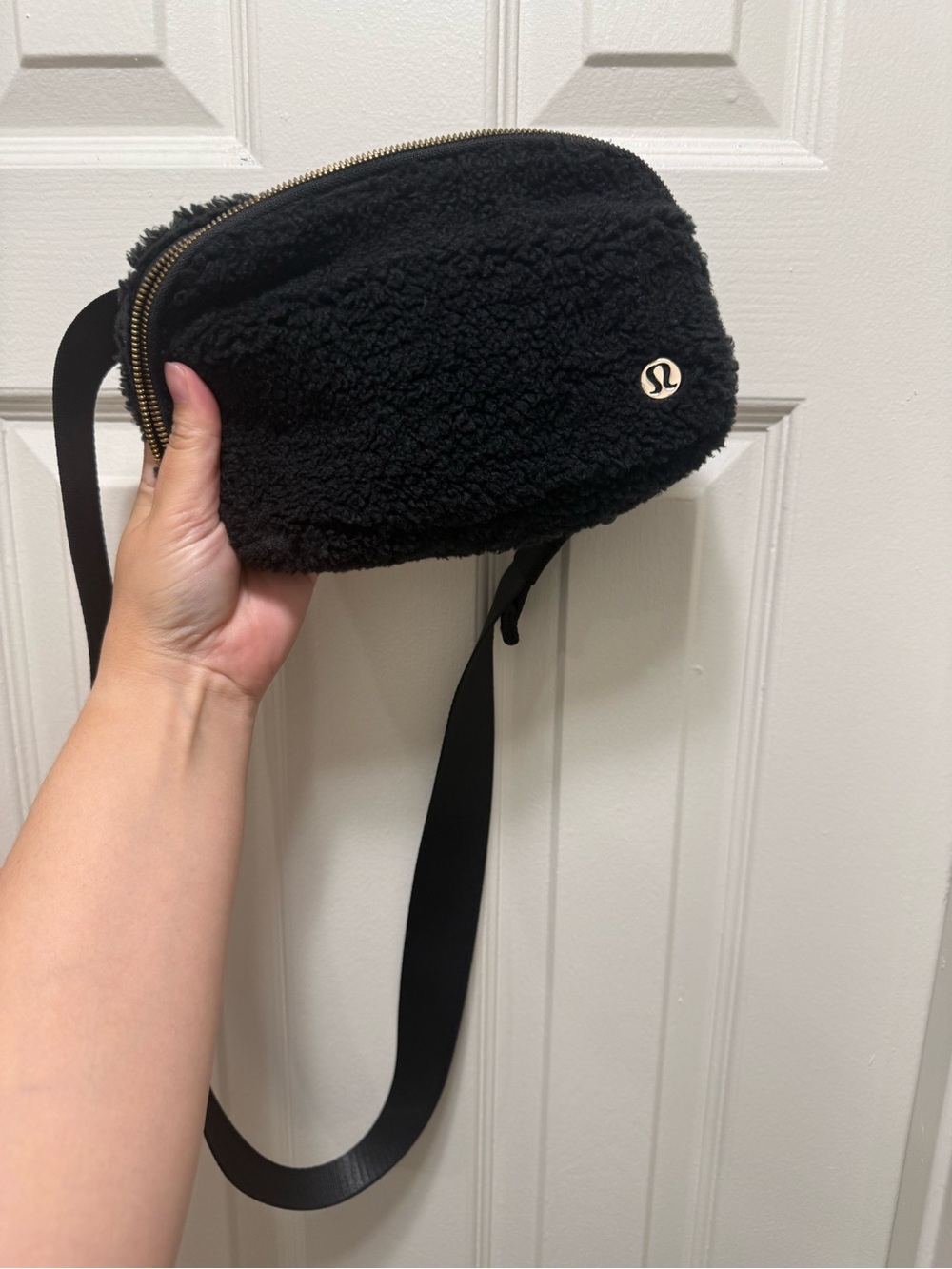 lululemon athletica Black Sherpa Crossbody Pouch with Gold Logo